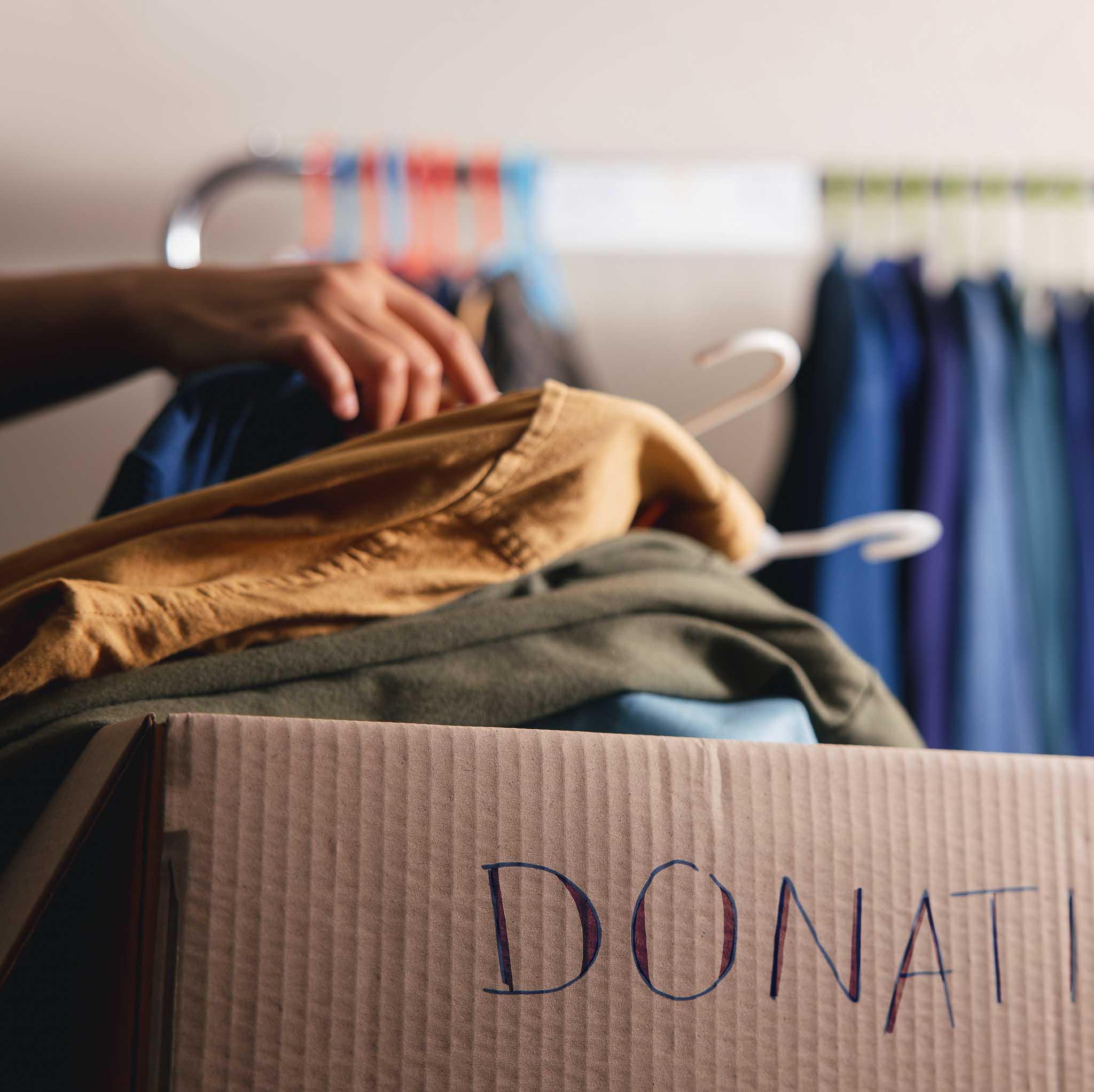 a stack of donated sweaters.