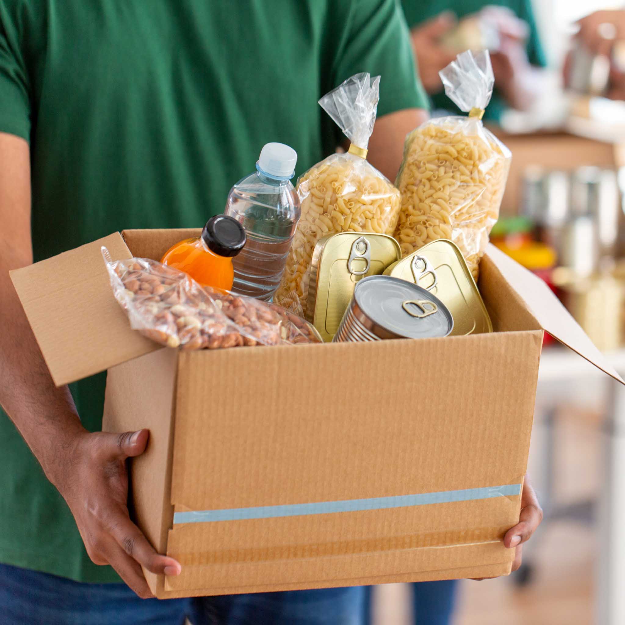 a box of food being given away