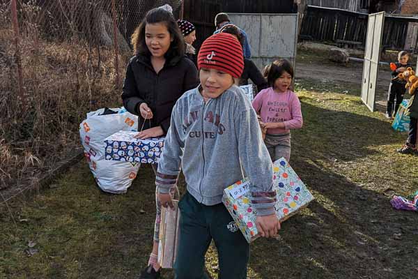 Happy Children with Their Gifts