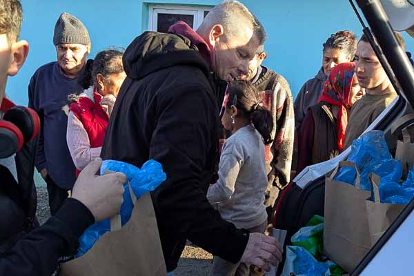 Distributing Gift Bags in the Village of Tichindeal